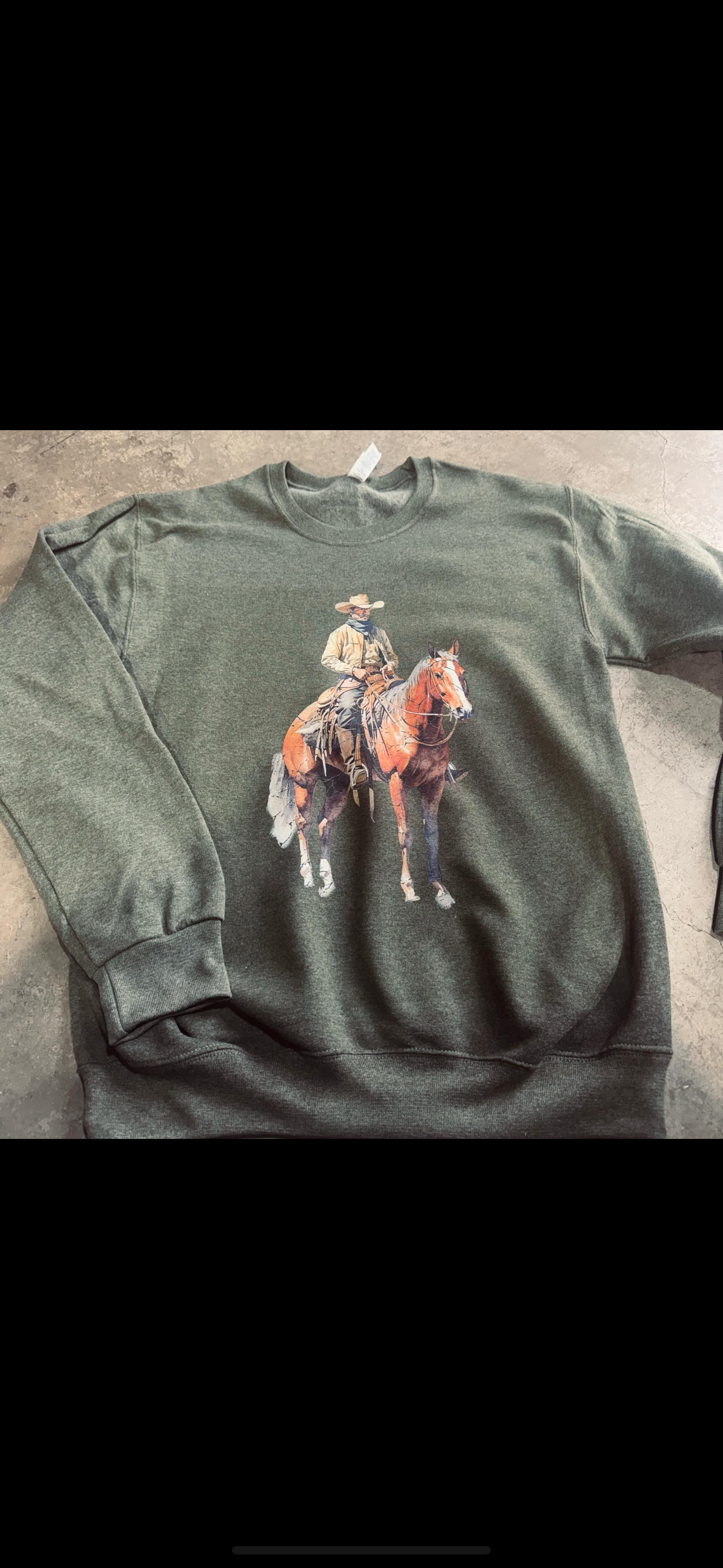 Cowboy Rides Away on Sweatshirt